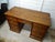 This desk is one piece. This Edwardian Solid Oak Pedestal Desk is a stunning piece of antique furniture, perfect for...