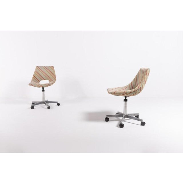Pair of swivel desk chairs designed by Augusto Bozzi for Saporiti with five star leg, multicolour fabric seat upholstery....