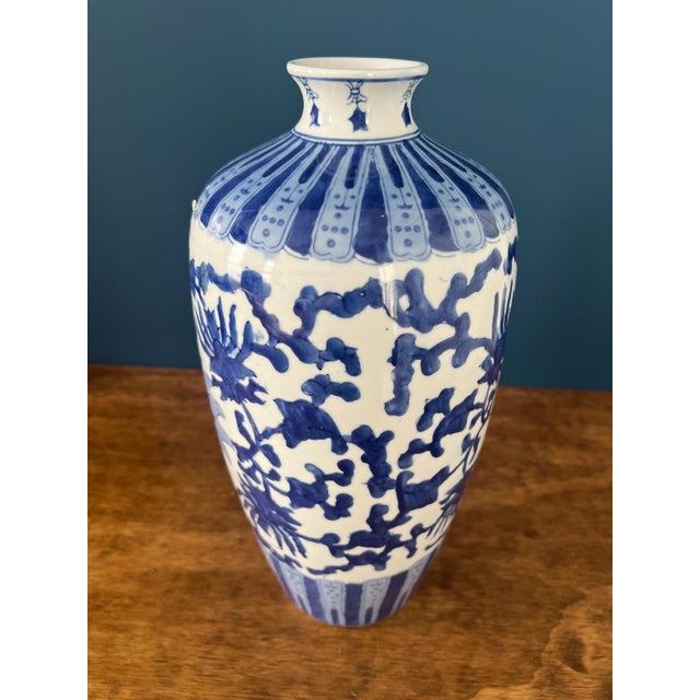 Beautiful Chinese Porcelain Chinoiserie Vase.The Chinoiserie plum vase is large at 14 1/2” and features a hand painted...