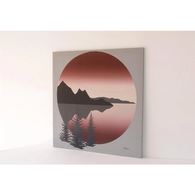 Vintage 70s era fabric art depicting a mountains and lake scene with pine trees. Striking contrast from the black, gray...