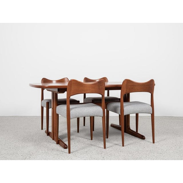 This oval dining table is manufactured by Skovby in Denmark in the 1960s. There is a logo under the table top. The table...