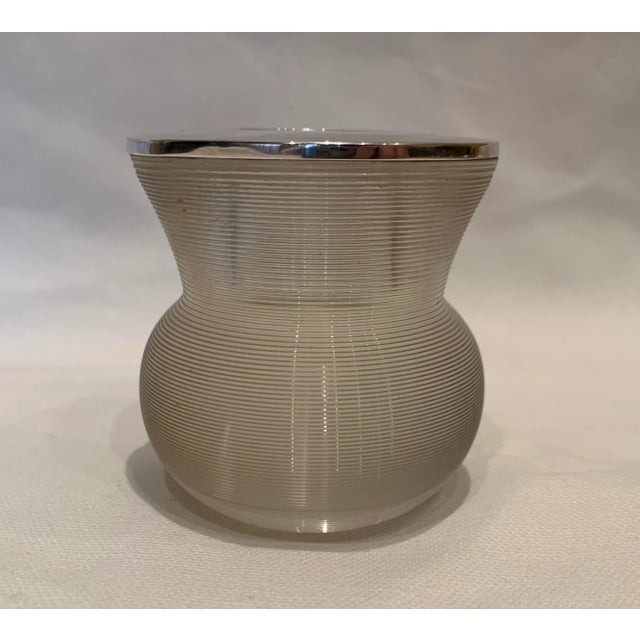 Turn-of-the-century British glass match striker with silver top. Purchased in London in the late 1980s.