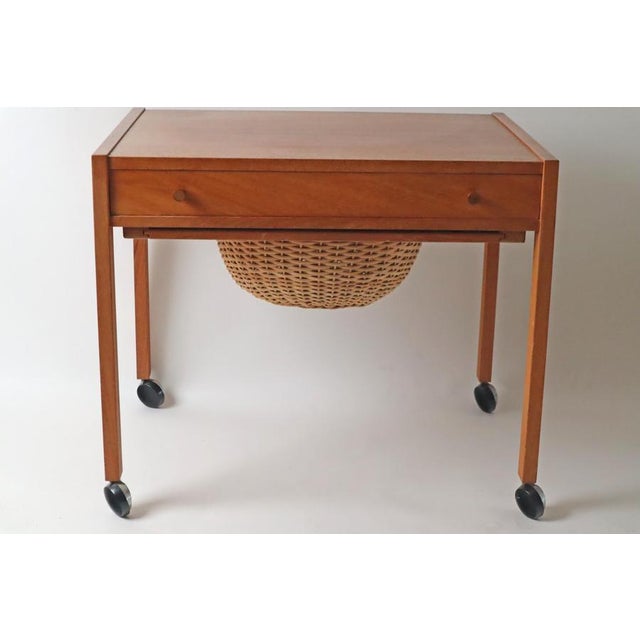 Side table with a Rattan Basket all the way from the 1950s. This table has its origin from europe but to be specific from...