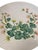 This vintage ceramic platter translates classic botanical illustration into a tactile, three-dimensional centerpiece....