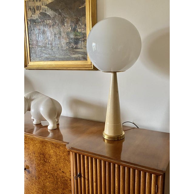 Monumental Mid-century table lamp France 1960s Conical base in brass and cream-coloured parchment. Milky glass sphere. H...