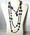 An exceptional mid-century 57-inch lariat necklace featuring an eclectic collection of attributed Venetian/Murano art-...