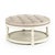 The Tammy Ottoman from Zentique is a round tufted ottoman in natural linen with brass nailhead trim on a distressed ivory...
