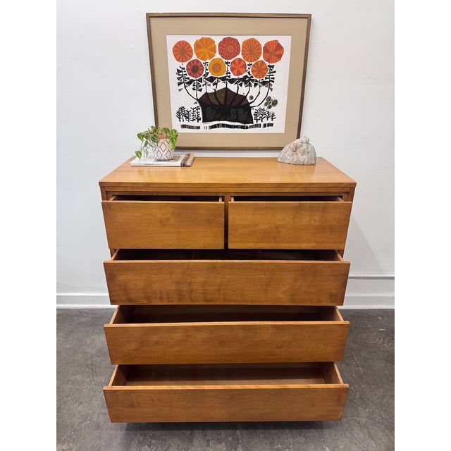 Mid-century modern tall dresser from Conant Ball’s iconic Modernmates collection, designed by Leslie Diamond. Crafted from...