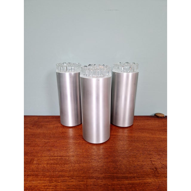 Set of three space age tubular ceiling lights in brushed aluminum and pressed glass, produced by the german manufacturer...