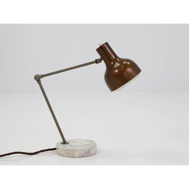 Italian Adjustable Table Lamp, Italy, 1960s, in Good conditions. Designed 1960 to 1969 This piece is designed in the style...