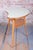 This elegant side table dates back to the 1950s and represents an iconic example of Czechoslovak "Mid-Century" design. The...