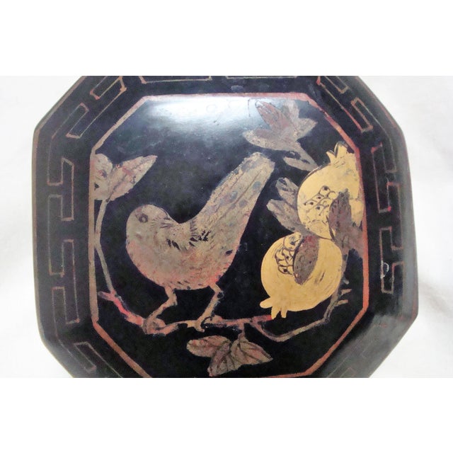 Made in People's Republic of China black and gold decorative lidded box, bird and pomegranate motif. Believe this is paper...