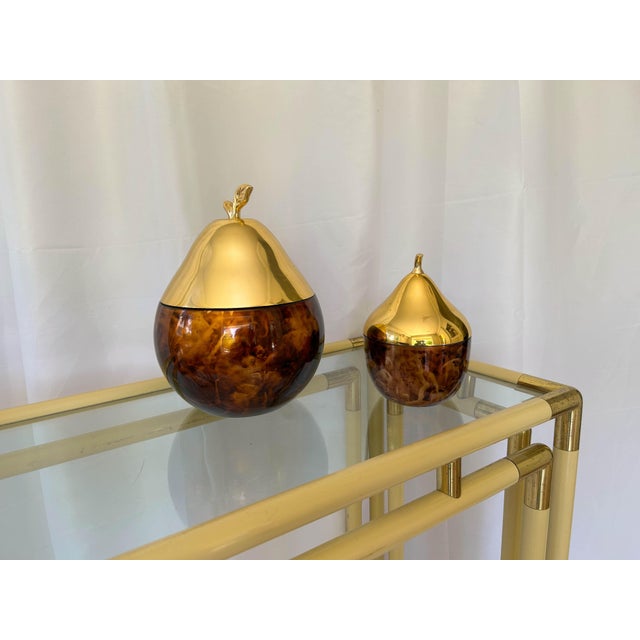 2 pear-shaped ice seals 1970 ht 20cm diam 30cm ht 13cm diam 20cm gold metal lid This piece has an attribution mark, I am...