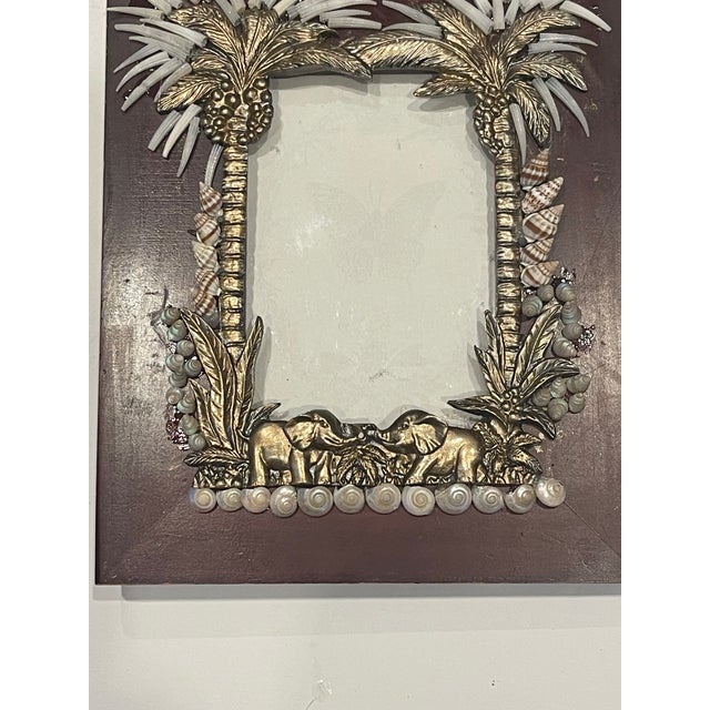 Lovely photo frame in safari tropical theme with elephants and sea shells encrusted.