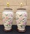 A pair of botanical Chinoiserie ginger jar table lamps. Featuring hand-painted, pink peony flowers on a cream background...