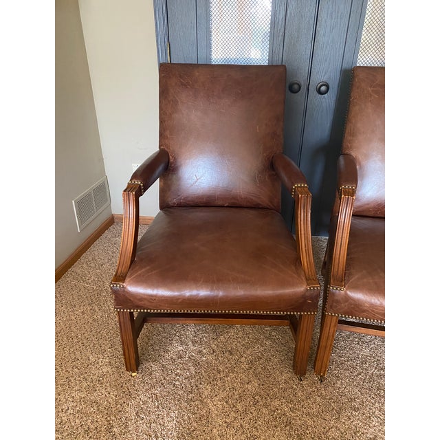 Beautiful pair of Ralph Lauren for Henredon executive/library chairs, crafted in rich brown full-grain leather with...