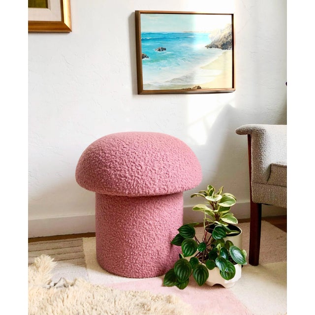 A handmade mushroom shaped ottoman, upholstered in a pink colored curly boucle fabric. Perfect for using as a footstool or...