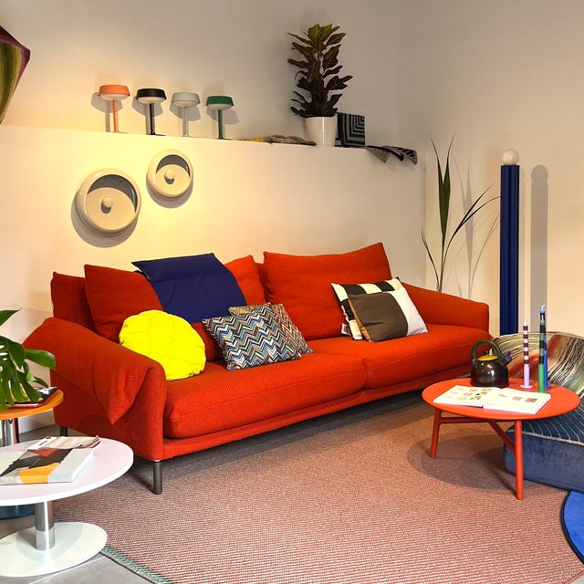 The soft peaks of the pillows and the base of the backrests overlap each other to simulate the mountainous profile of the...