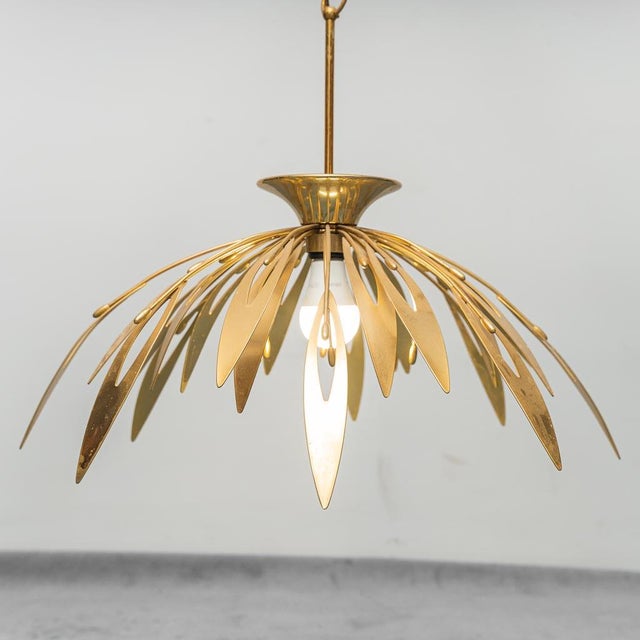 Chandelier from the 1970s. Brass frame. Good condition, minor signs of wear as shown in photos. Up to 250V (Europe/UK...