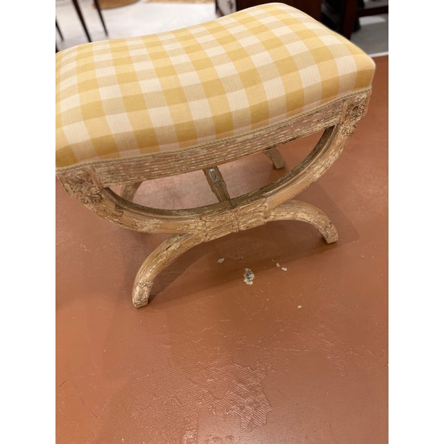 Classical style bench with an old distressed painted finish. From the collection of a top Atlanta decorator so the fabric...