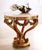 Handcrafted in Italy, this center table is made from solid wood and features exquisite hand-carved swags that exemplify...