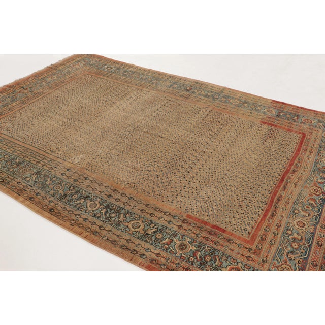 This 7x10 antique Persian Ziegler Mahal rug is an exceptional piece curated by Rug & Kilim, handwoven in wool and believed...