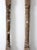 Pair of antique wooden architectural columns featuring turned wood posts with beautifully distressed white paint and a...