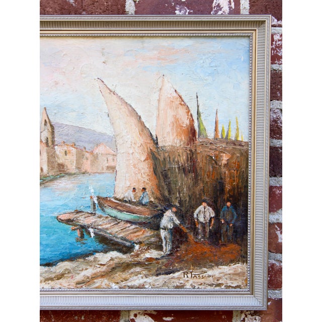 A beautiful harbor, sailboat painting from France, circa 1920. Signed "R Passade" lower right. This lovely antique oil...