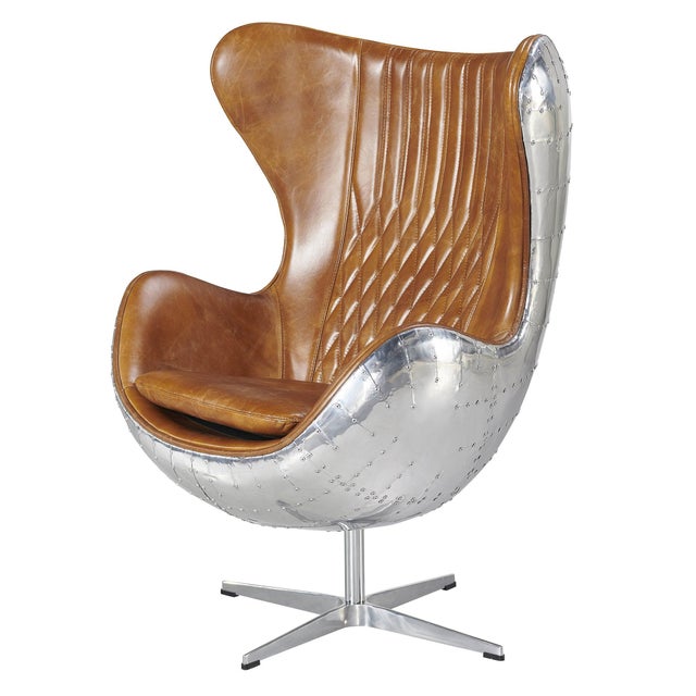 "The Cruz Egg Chair has all the aviator glam of the 1950's. This classic design has a rustic brown leather with stitching...
