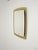 This Italian mid-century modern wall mirror, commonly attributed to the renowned Cristal Art manufacturing company, was...