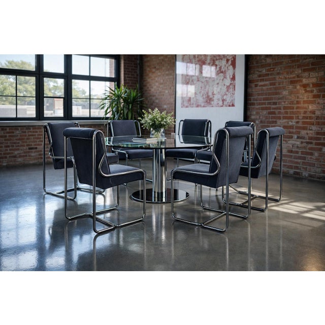 Set of six 1980s chrome cantilever dining chairs with gray velvet upholstery. The chairs feature continuous tubular chrome...