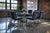 Set of six 1980s chrome cantilever dining chairs with gray velvet upholstery. The chairs feature continuous tubular chrome...