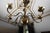 Beautiful flemish chandelier made of patinated brass. The arms are figuratively decorated with fish. The top part with a...