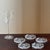 Transparent Vintage Mid-20th Century Pressed Glass Starburst Coasters – Set of Five For Sale - Image 8 of 8