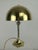 Solid brass, mirror polished table lamp from the 1920s Total height: 32 cm Diameter of the shade: 20 cm Diameter of the...