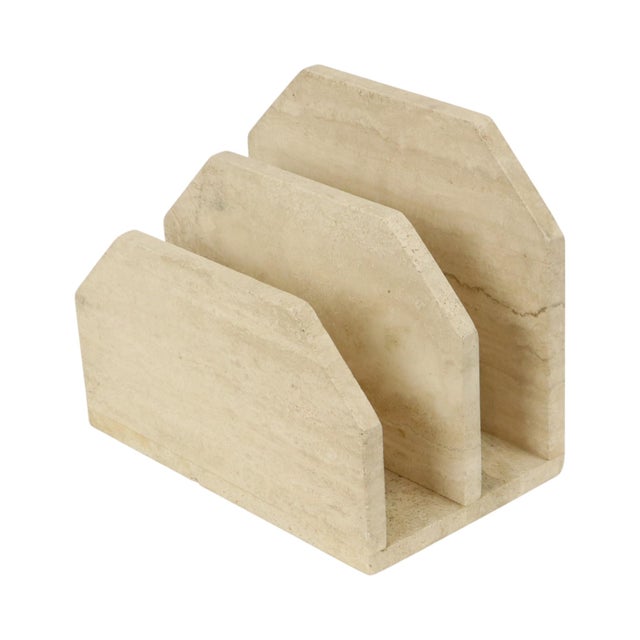 A beautiful, high-quality magazine rack or holder featuring a geometric design with stepped compartments of increasing...