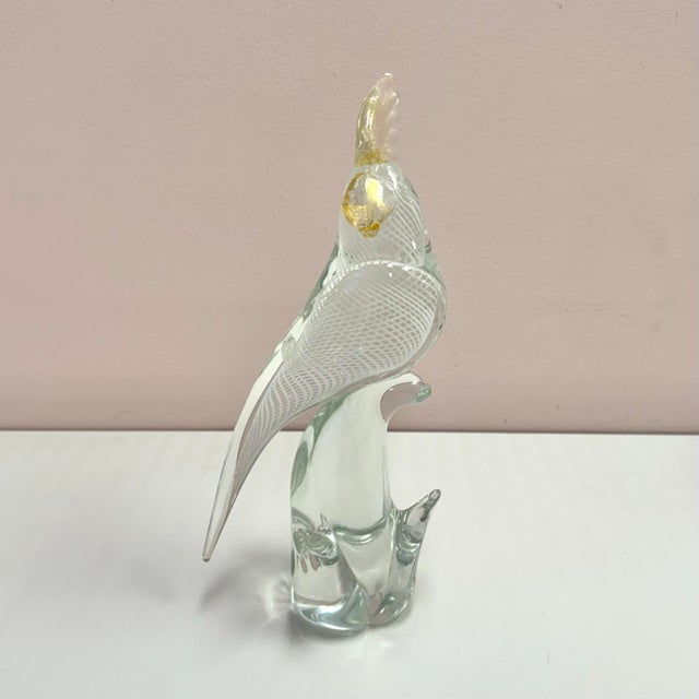 A stunningly beautiful hand blown Murano glass cockatoo sculpture, made in Italy c.1960's. Clear glass with white filigree...