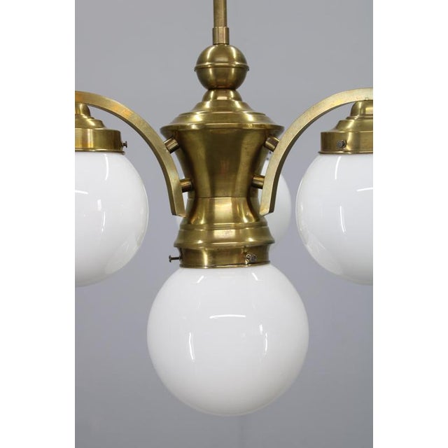 1930s Czechoslovak Art Deco Brass Chandelier with Four Opaline Glass Globes For Sale - Image 4 of 14