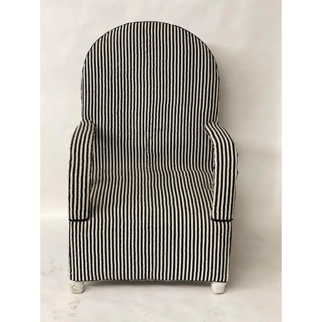 Handmade in Nigeria, these chairs are unique, all cover in beads. Seat height is 15". Measures 26" W x 23" D x 39" H with...