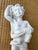 Mid Century Resin figurine statue of a cherub. Made in Italy by Edward P. Paul. Cherubs represent innocence or divine love.