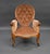 Victorian walnut armchair in good condition with buttoned pear drop shaped back with serpentine front, scroll arms...