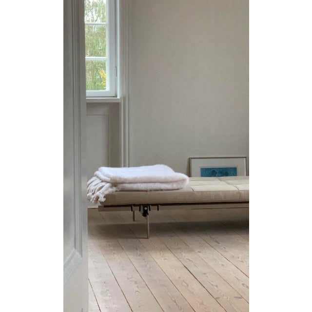 Loewe 73% Mohair & Wool Throw Blanket, White, 130 × 200 cm Loewe, Spain, 73% Mohair / 27% Wool A luxurious and beautifully...