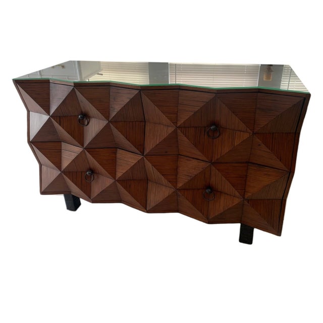 .Purchased in a very high-end interior design place. Superb design. It was listed as a Marge Carson, but I don't see any...