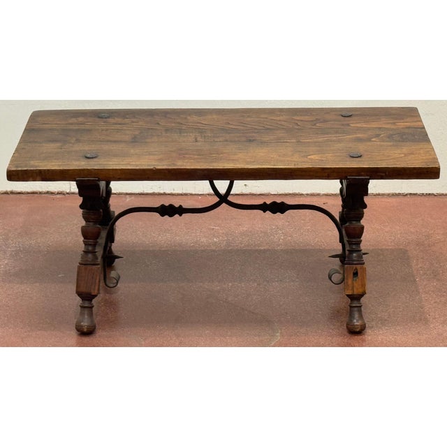 Spanish Castilian Refectory Style Walnut & Wrought Iron Coffee Table, Early 20th Century Dimensions: 18" D x 39" W x 17" H...