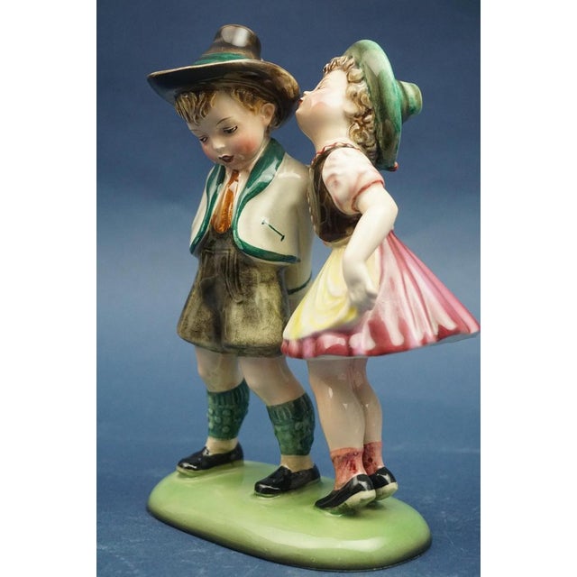 Item description: Fabulous polychrome glazed ceramic sculpture. Depicting two adorable children in Tyrolean dress, signed...