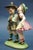 Item description: Fabulous polychrome glazed ceramic sculpture. Depicting two adorable children in Tyrolean dress, signed...