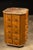 A rare oak rotating cabinet featuring 40 small drawers arranged across multiple faceted sides. Designed for apothecary,...