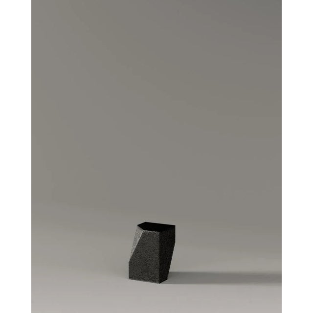 Bevel side table by ​​hadge dimensions: d 36 x w 36 x h 40 cm. Materials: steel. Finish: weathered rammed black earth....