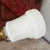 This vintage Aladdin desk lamp features a gooseneck design with a cast iron base and milk glass shade. Its embossed...