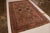 Hand knotted in wool originating circa 1890-1900, this antique Persian rug, whose origins lie in the celebrated Kerman...